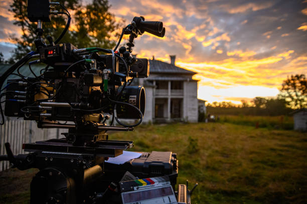 A digital cinema camera sits ready for action at sunrise.